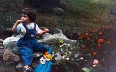 Artists Grandaughter Playing Near Irene's Koi Pond