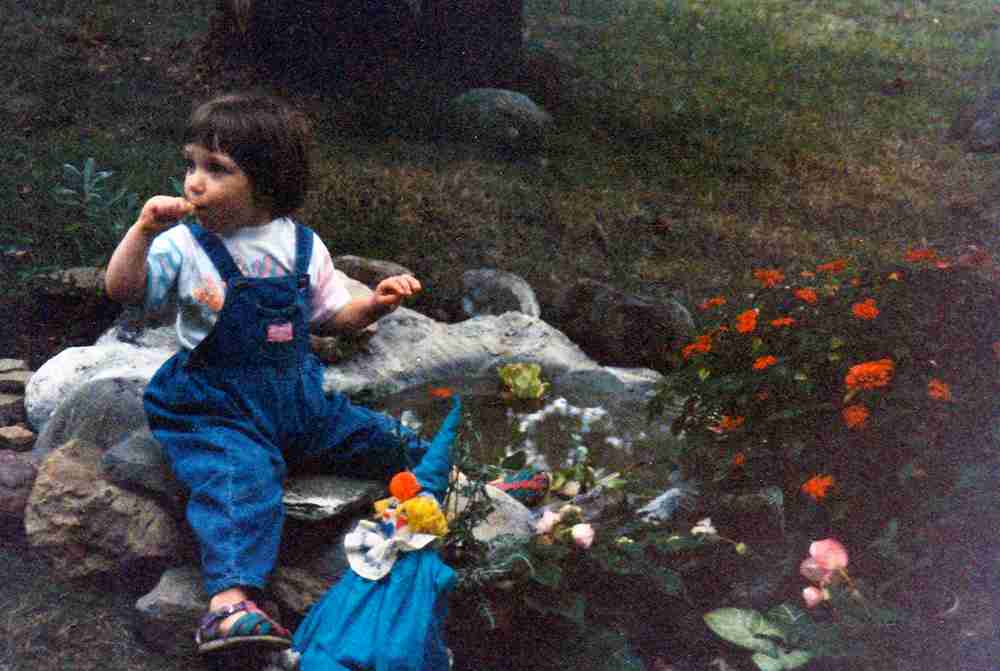 Artists Grandaughter Playing Near Irene's Koi Pond